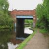 Unusual girder and red brick bridge on this canal by John Howarth – 22 May 2009