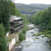The Chain Bridge Hotel overlooking the River Dee - with the Chain Bridge in the background by Geoff Farmer – 26 August 2006