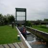 Woodford lock and disused rail bridge behind by Lazy boater – 17 May 2009